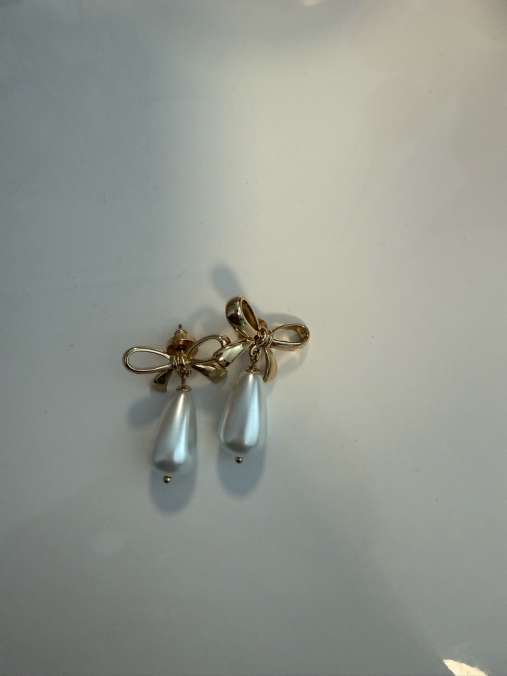Gold Bow Earrings with White Teardrop Pearls
